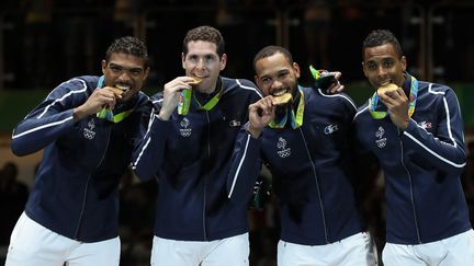 &nbsp; (Jean-Michel Lucenay, Yannick Borel, Gauthier Grumier and Daniel Jerent savourent leurs médailles © maxPPP)