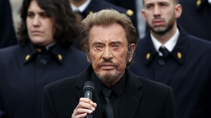 Johnny Hallyday, à Paris, le 10 janvier 2015. (YOAN VALAT / AFP)