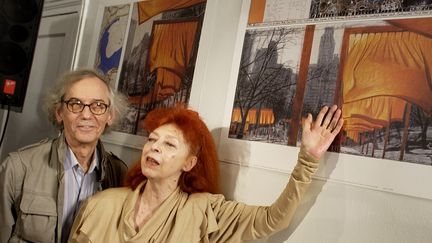 Christo et sa femme Jeanne-Claude se sont rencontrés à Paris (ici en 2004 à New York). (STAN HONDA / AFP)