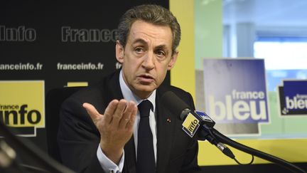 Nicolas Sarkozy dans les studios de France info, le 13 mars 2013, à Paris. (ERIC FEFERBERG / AFP)