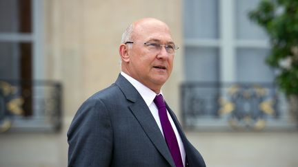 Le ministre du Travail, Michel Sapin, au palais de l'Elys&eacute;e, &agrave; Paris, le 1er ao&ucirc;t 2012. (BERTRAND LANGLOIS / AFP)