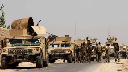 Des soldats afghans dans la province d'Helmand, le 10 août 2016. (NOOR MOHAMMAD / AFP)