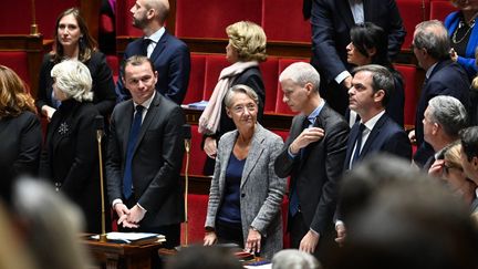 Le ministre du Travail Olivier Dussopt, la Première ministre Elisabeth Borne, le ministre délégué chargé des Relations avec le Parlement, Franck Riester, et le porte-parole du gouvernement, Olivier Véran, à l'Assemblée nationale, le 3 novembre 2022. (ALAIN JOCARD / AFP)