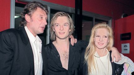 Johnny Hallyday en 2005 avec David et Sylvie Vartan
 (BERTRAND GUAY / AFP)