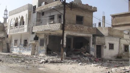 Une maison bombard&eacute;e dans le quartier de Bab Amr, &agrave; Homs (Syrie), le 13 f&eacute;vrier 2012. (REUTERS)