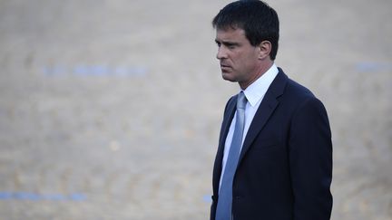 Le ministre de l'Int&eacute;rieur, Manuel Valls, le 14 juillet 2013, &agrave; Paris. (LIONEL BONAVENTURE / AFP)