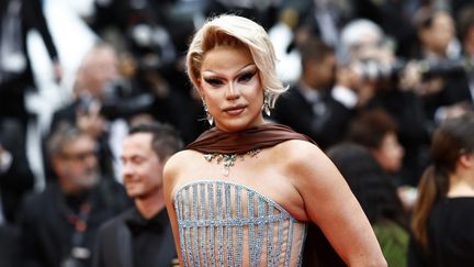 L'artiste drag-queen Nicky Doll lors de la 77ᵉ édition du Festival de Cannes, le 15 mai 2024. (SAMEER AL-DOUMY / AFP)