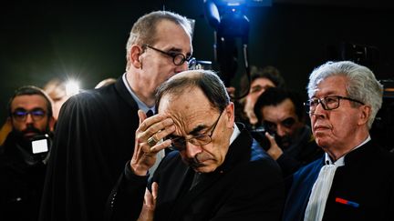 Le cardinal Barbarin arrive au tribunal correctionnel de Lyon (Rhône) pour son procès, le 7 janvier 2019. (JEFF PACHOUD / AFP)