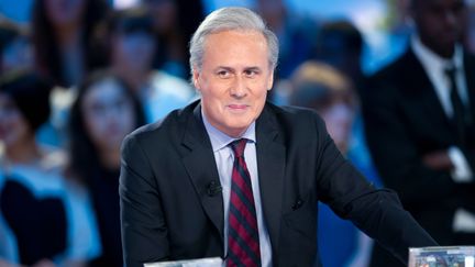 L'ancien secr&eacute;taire d'Etat Georges Tron au Grand Journal de Canal +, le 11 mai 2012. (BERTRAND LANGLOIS / AFP)