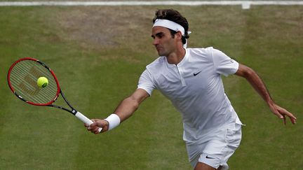 Roger Federer dans ses oeuvres (ADRIAN DENNIS / AFP)