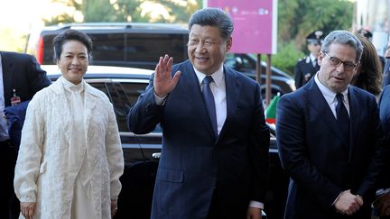 Xi Jinping et son épouse&nbsp;Peng Liyuan, à Palerme (Italie), le 23 mars 2019. (GUGLIELMO MANGIAPANE / REUTERS)