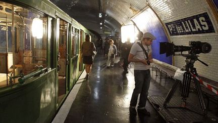 FRANCE, Paris : People visit an unused area of the metro station &quot;Porte des Lilas&quot;, where an old Paris&#039; metro wagon is displayed, on September 17, 2011 in Paris. This area, used for movies, opened its doors today as part of the European heritage open days. For two days a year in Paris and the rest of France, thousands of monuments, government buildings, and privately owned sites of interest open their doors to give the public free reign to areas that are generally not accessible. AFP PHOTO THOMAS SAMSON
 (AFP PHOTO THOMAS SAMSON)