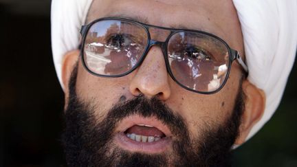 Man Haron Monis, en 2010, lors d'une conf&eacute;rence de presse au tribunal de Sydney (Australie). (STEPHEN COOPER / NEWSPIX / REX / SIPA)