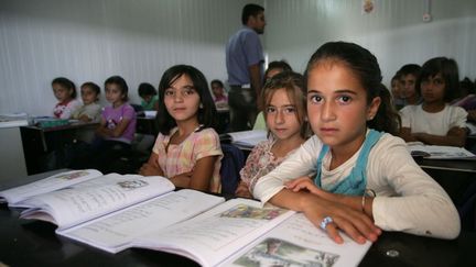 Des enfants syriens en classe dans le camp de réfugiés de Domiz, au nord de l'Irak, le 29 mai 2013. (AFP)