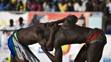 Aux 8e Jeux de la Francophonie, la lutte africaine est une discipline. Contrairement à la lutte libre, également disputée lors de ces Jeux, et à la lutte gréco-romaine, elle n’est pas un sport olympique. Les règles sont différentes. Au Sénégal, plus qu'un sport, il s'agit d'une pratique culturelle. (REUTERS/Finbarr O’Reilly)