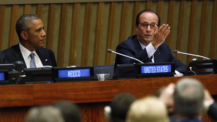 Barack Obama et François Hollande, le 24 septembre 2014 à l'ONU, à New York (Etats-Unis). (KEVIN LAMARQUE / REUTERS)