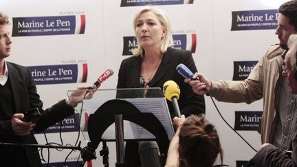 Marine Le Pen lors de la conférence de presse (KENZO TRIBOUILLARD / AFP)