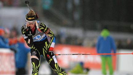 Marie Dorin a offert la médaille d'argent au relais féminin français (RALF HIRSCHBERGER / DPA)