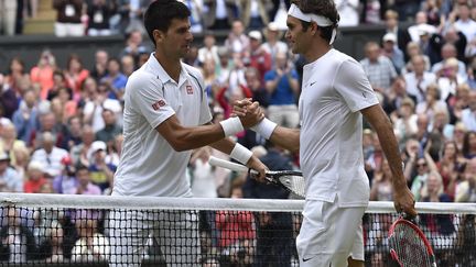 Djokovic-Federer, une rivalité qui n'est pas près de s'arrêter. (TOBY MELVILLE / POOL)