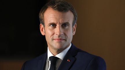 Emmanuel Macron lors d'une conférence de presse à la fin d'un sommet du Fonds mondial de lutte contre le sida la tuberculose et le paludisme, le 10 octobre 2019 à Lyon (Rhône). (LUDOVIC MARIN / AFP)