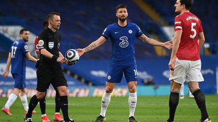 L'attaquant français de Chelsea Olivier Giroud contre Manchester United en Premier League le 28 février 2021. (ANDY RAIN / POOL)