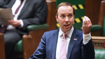 Le secrétaire d'Etat britannique à la Santé,&nbsp;Matt Hancock, le 2 décembre 2020 à la Chambre des communes, à Londres, lors d'une intervention sur l'épidémie de Covid-19. (JESSICA TAYLOR / AFP)