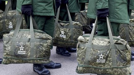 Des soldats prêts à être déployés dans la région de Donetsk (Ukraine) par Moscou, le 16 novembre 2024, à Rostov-sur-le-Don (Russie). (ARKADII BUDNITSKII / ANADOLU / AFP)