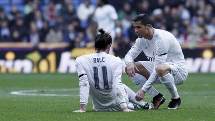 Gareth Bale, blessé, et Cristiano Ronaldo a ses côtés (GUILLERMO MARTINEZ / NURPHOTO)