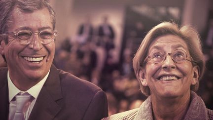 Patrick et Isabelle Balkany, lors d'un meeting organisé à Rueil-Malmaison (Hauts-de-Seine) pendant la campagne des régionales, le 3 décembre 2015. (LIONEL BONAVENTURE / AFP / NOEMIE CARON)