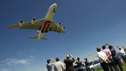 Ces passionnés capables de décrire au premier coup d'œil toutes les caractéristiques d'un appareil (AFP Photo / Toussaint Kluiters)