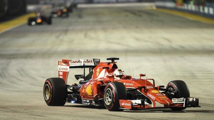 Sebastian Vettel (Ferrari), parti en pole position, s'est montré le plus rapide dans les rues de Singapour. (MOHD RASFAN / AFP)