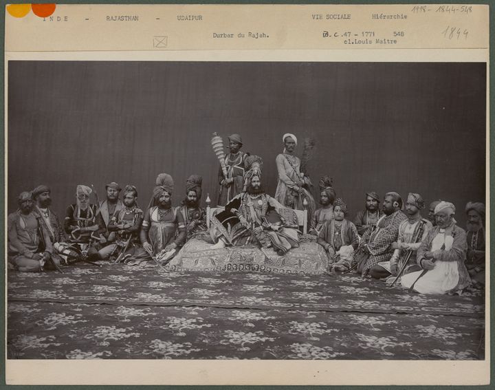 "Portrait of the Maharajah on his throne, among his advisors".  (JOHNSTON AND HOFFMAN / MUSEUM OF MAN - PHOTO LIBRARY)