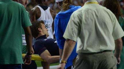 Le sprinteur français Christophe Lemaître, blessé après sa finale du 100m