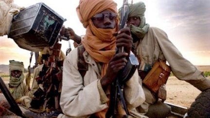 Des jihadistes pr&eacute;sum&eacute;s photographi&eacute;s &agrave; Gao, dans le nord du Mali, le 12 janvier 2013. (STRINGER / AFP)