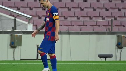 Lionel Messi tête basse avec le Barça malgré son 700e but inscrit en carrière (LLUIS GENE / AFP)