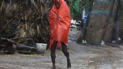 Les vents ont &eacute;t&eacute; accompagn&eacute;s de pluies tr&egrave;s violentes qui ont provoqu&eacute; des inondations dans plusieurs villages des Etats tr&egrave;s pauvres de l'Orissa et Andrah Pradesh, . ( ADNAN ABIDI / REUTERS)