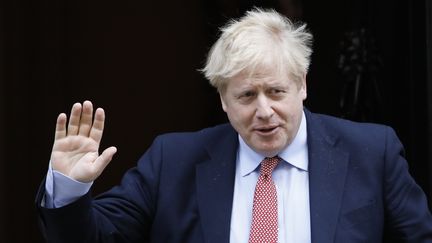 Le Premier ministre britannique, Boris Johnson, quitte Downing Street à Londres, le 18 mars 2020. (TOLGA AKMEN / AFP)