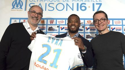 Patrice Evra a donné sa première conférence de presse sous ses nouvelles couleurs (ANNE-CHRISTINE POUJOULAT / AFP)