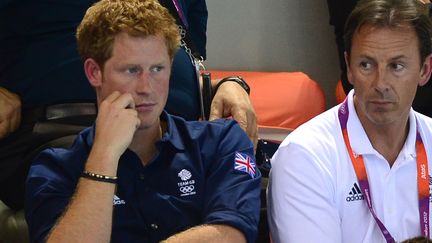 Le prince Harry assiste aux &eacute;preuves de natation des JO de Londres, le 1er ao&ucirc;t 2012. (MARTIN BUREAU / AFP)