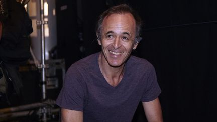 Jean-Jacques Goldman lors d'un concert des Enfoirés à&nbsp;Ouveillan, dans l'Aude, le 20 juillet 2014. (GAILLARD NICOLAS / APERCU / SIPA)