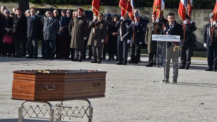 Le maire de Trèbes, Eric Menassi, aux funérailles des victimes de l'attaque terroriste du 23 mars 2018. (PASCAL PAVANI / AFP)