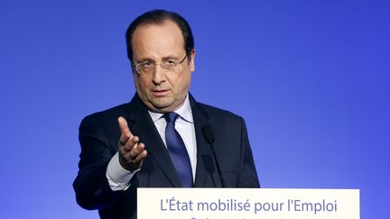 Le pr&eacute;sident de R&eacute;publique, Fran&ccedil;ois Hollande, lors de son discours pour l'emploi, &agrave; la Maison de la chimie, &agrave; Paris, le 28 avril 2014.&nbsp; (YOAN VALAT / AFP)