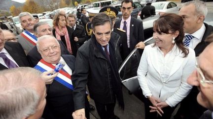 Sophie Dion (à droite) en compagnie de François Fillon, à Morzine en novembre 2011 (JEAN-PIERRE CLATOT / AFP)