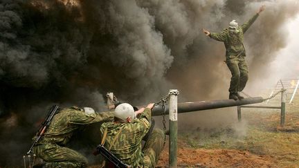 Ils doivent pouvoir s’adapter à tous les terrains et connaître les techniques de survie en milieu hostile. (REUTERS/Julia Darashkevish)