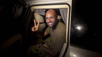 Le deuxi&egrave;me fils de Mouammar Kadhafi, Sa&iuml;f al-Islam, &agrave; Tripoli (Libye) le 23 ao&ucirc;t 2011. (DARIO LOPEZ MILLS / AFP)