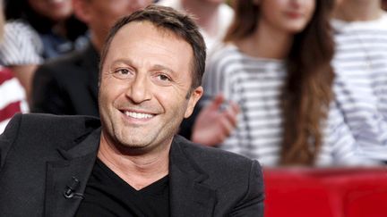 L'animateur et producteur Arthur, sur le plateau de l'&eacute;mission "Vivement dimanche", sur France 2, le 21 septembre 2011. (MAXPPP)