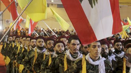 Des membres du Hezbollah défilent à Beyrouth au Liban, le 31 mai 2019. (MARWAN NAAMANI/ZUMA PRESS/ZUMA/REA)