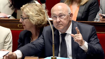 Le ministre du Budget, Michel Sapin, le 10 juin 2014 &agrave; l'Assembl&eacute;e nationale.&nbsp; (STEPHANE DE SAKUTIN / AFP)