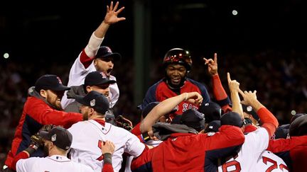 La joie des Boston Red Sox (ROB CARR / GETTY IMAGES NORTH AMERICA)