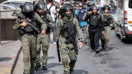 Des soldats de l'armée israélienne à Jérusalem-Est, partie de la ville annexée par Israël, le 27 octobre 2023. (AHMAD GHARABLI / AFP)